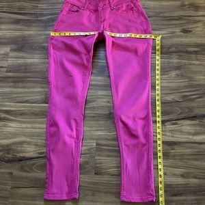 Woman’s hot pink jeans, size 9.
